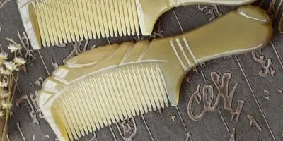 Handcrafted buffalo horn comb showcasing natural texture and traditional Indian craftsmanship