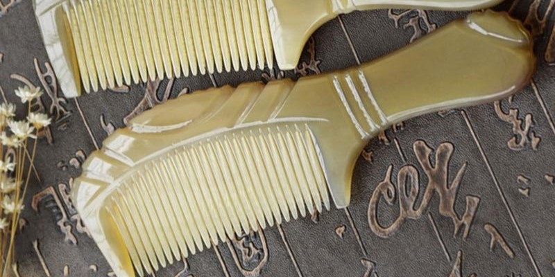 Handcrafted buffalo horn comb showcasing natural texture and traditional Indian craftsmanship